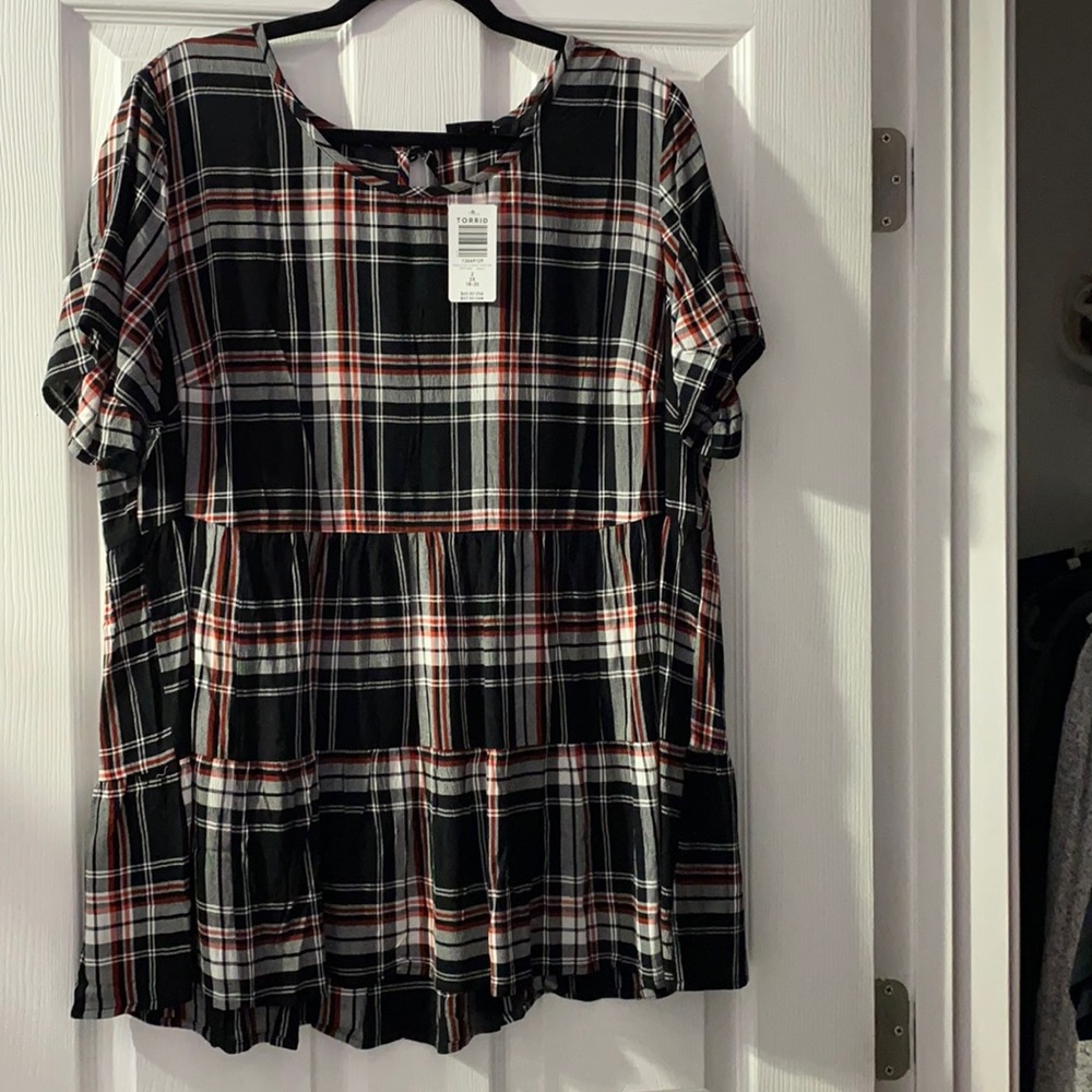 Torrid size 2 tiered shirt. Smoke free home. NWT.